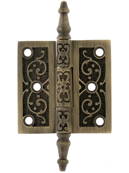2 1/2 inch Solid Brass Steeple Tip Hinge With Decorative Vine Pattern in Antique Brass.